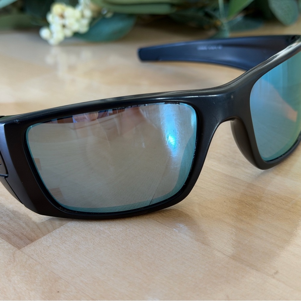Oakley Fuel Cell Matte Black Sunglasses with Ice Blue Polarized Lenses - Picture 12 of 12